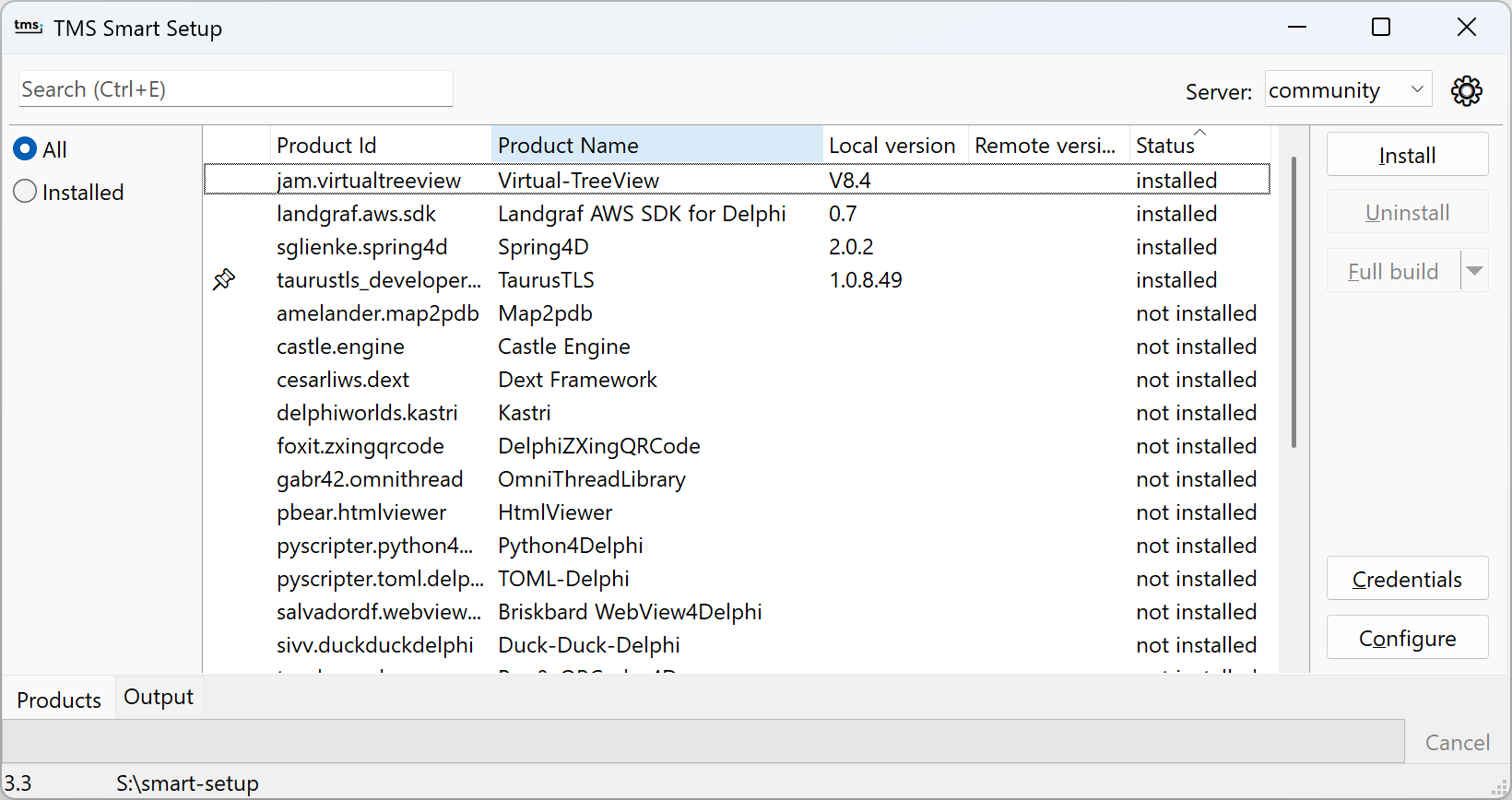 The TMS Smart Setup desktop app: a searchable product list showing each package's ID, name, local and remote versions, and install status, with Install, Uninstall, and Full build actions and a server selector.